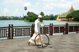 The Bicycle Tyre Rolling Event from Yangon Kandawgyi Park by Moe Satt contemporary artwork photography