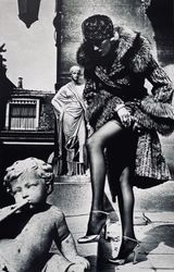 Woman in Coat Adjusting Stocking Paris 1975 by Helmut Newton contemporary artwork print
