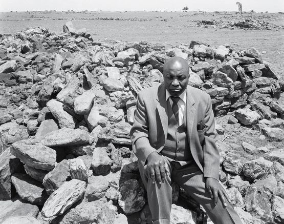 Luke Kgatitsoe in his house bulldozed in February 1984 by the government after the forced removal of the people of Magopa a black-owned farm which had been declared a black spot Ventersdorp district Transvaal. 21 October 1986 4_4588 by David Goldblatt contemporary artwork Photography