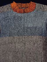 The mother knit a sweater for the father using yarn unraveled from another sweater by Ying Xinxun contemporary artwork textile