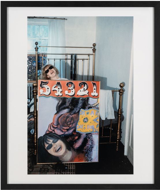 Untitled Pauline holding 5-4-3-2-1 painting  by Michael Ward contemporary artwork Photography