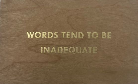 Words Tend To be Inadequate- gold Truism series by Jenny Holzer contemporary artwork Sculpture