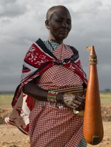 Naitoti with a Painted Lady Butterfly on Her Milk Gourd Kenya by Lucas Foglia contemporary artwork print