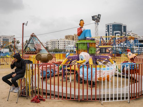 Bacem Smoking at a Port of Sfax Carnival Tunisia by Lucas Foglia contemporary artwork Print
