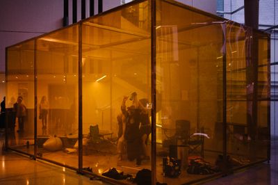Alicia Frankovich Stages Performance in Wildfire-Orange Cube
