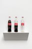 Insercoes em Circuitos Ideologicos Projeto Coca-Cola Insertions into Ideological Circuits Coca-Cola Project by Cildo Meireles contemporary artwork Sculpture