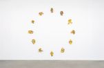 circle of twelve embraces in yellow light by Andrew Lord contemporary artwork Sculpture