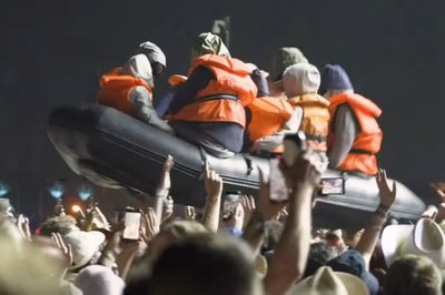 Banksy Floats Refugee Boat Across Crowds at Glastonbury
