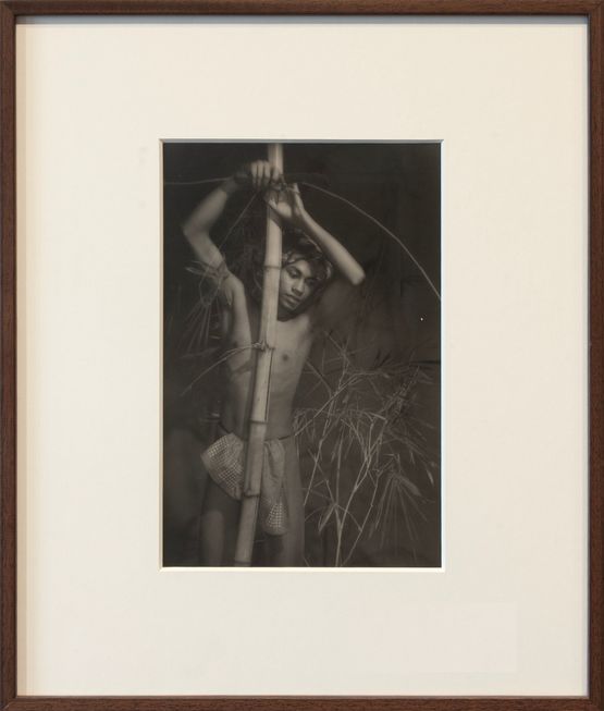 Young man with bamboo and sickle by Lionel Wendt contemporary artwork Photography
