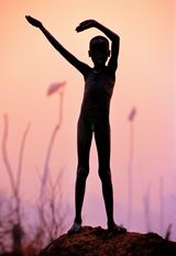 Dinka Child Imitating Horns of a Favorite Bull South Sudan 2006 by Carol Beckwith  Angela Fisher contemporary artwork photography