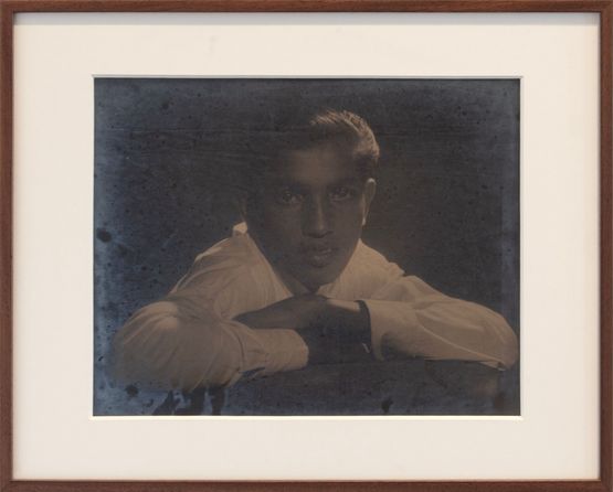 Young man with folded hands by Lionel Wendt contemporary artwork Photography