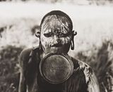 A woman from the Surma tribe Ethiopia by Don Mccullin contemporary artwork photography