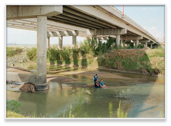 Fragment IV Family under the Presidio-Ojinaga-International Bridge TexasMexico Border from Silent General by An-My Le contemporary artwork Print