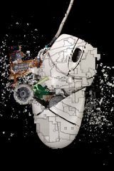 A destroyed computer mouse sliced by Exonemo contemporary artwork sculpture