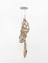Untitled hanging burlap piece with many holes by Mire Lee contemporary artwork sculpture textile