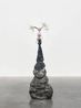Centurience possessing the primordial patience to outlast catastrophe by barely moving at all knowing that sometimes the greatest revolution is simply refusing to hurry toward extinction. In darkness... by Marguerite Humeau contemporary artwork Sculpture