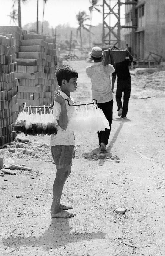 Poor Child Peddling Cold Drinks Under the Hot Sun by Loke Hong Seng contemporary artwork Works on Paper