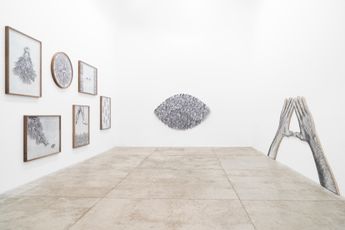 Contemporary art exhibition JR o papel da mao at Galeria Nara Roesler Sao Paulo Brazil