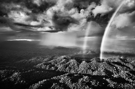 Rainbow over the Tucuxim area Parima Forest Reserve Yanomami Indigenous Territory state of Roraima Brazil by Sebastiao Salgado contemporary artwork Photography