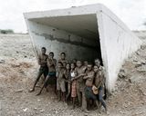 Children of Pomfret at the entrance to the incline shaft and underground pool of water in which they swim Pomfret Blue Asbestos Mine which closed in 1986 North-West Province 20 December 2002 by David Goldblatt contemporary artwork print