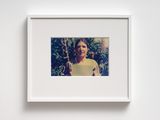 Self-test holding my grey colour test card in my mothers garden. Onerao. Taranaki by Fiona Clark contemporary artwork photography