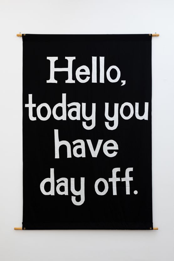 Hello today you have day off wording of text message sent to a worker on a zero hours contract informing him his labour would not be required that day by Jeremy Deller contemporary artwork Textile